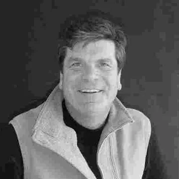 steve-headshot A black and white photo of a man smiling.